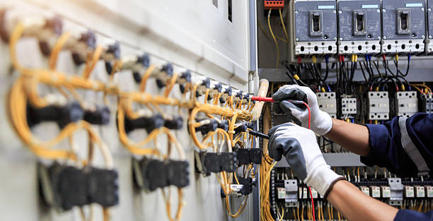 Professional Electrician technician working in Littleton Common, MA